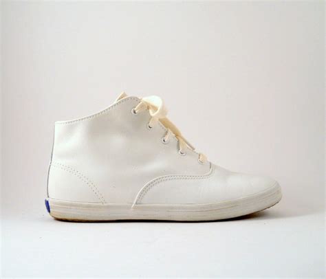 keds white leather high top.